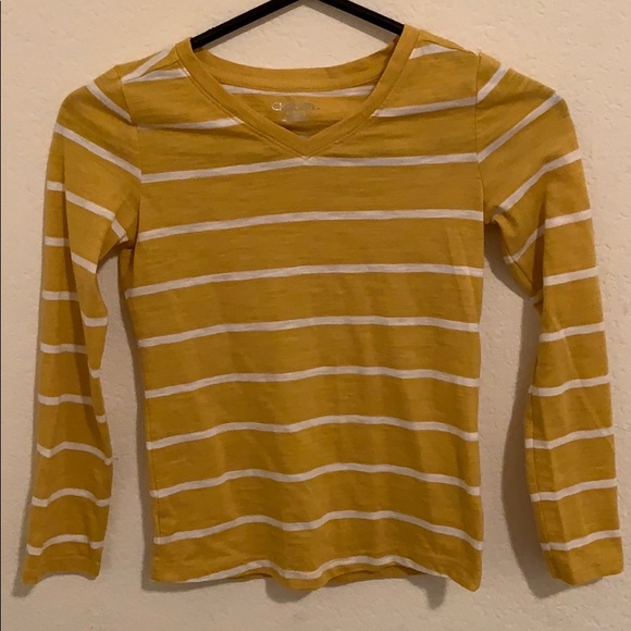 orange and yellow striped long sleeve shirt